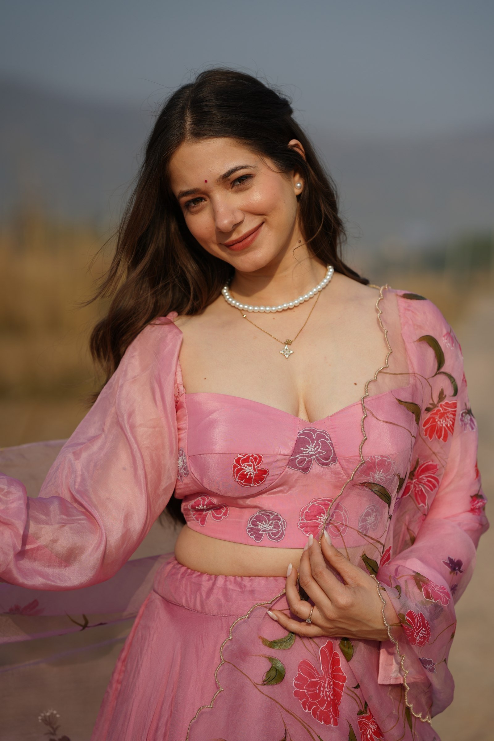 Model Close-up in Handpainted Silk Lehenga and Corset Blouse